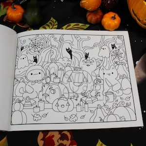 May include: Black and white Halloween-themed coloring book page featuring pumpkins, cats, ghosts, and candles. The detailed illustration includes a variety of spooky elements, perfect for creative coloring and seasonal fun.