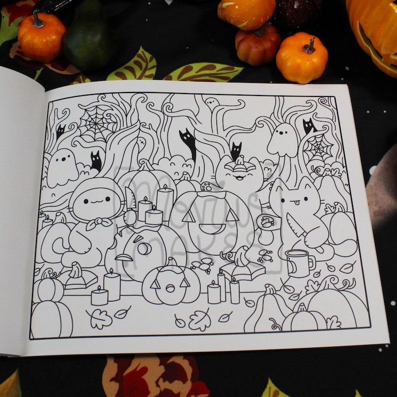 May include: Black and white Halloween-themed coloring book page featuring pumpkins, cats, ghosts, and candles. The detailed illustration includes a variety of spooky elements, perfect for creative coloring and seasonal fun.