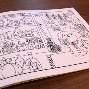 May include: A black and white line drawing of a witch's shop with shelves full of potions, herbs, and other magical supplies. A witch with a pointed hat and a broom is standing in front of the shop, holding a scroll with a pentagram on it. The text on the sign above the shop reads "Magic Supplies".