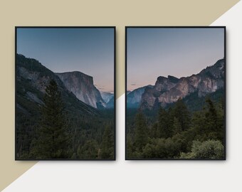May include: A diptych wall art set featuring two framed vertical prints of a mountain landscape at dusk. The images display rocky cliffs, dense evergreen forests, and a soft twilight sky in shades of blue, grey, and muted pink, enclosed in black frames.