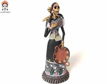Catrina artisan with her baby - 30 cm. 12 in.