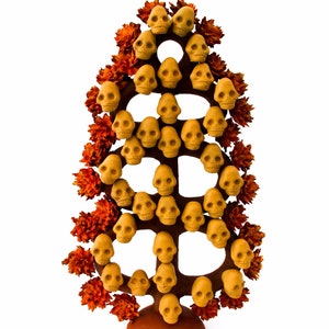 Day of the Dead offering with skulls and cempasuchil