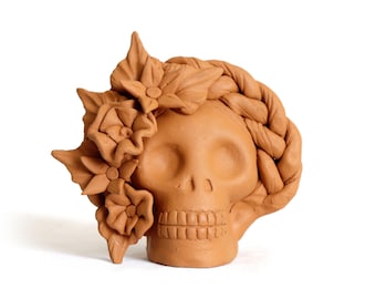 Piccolo vaso arancione a forma di teschio con fiori - Giorno dei Morti