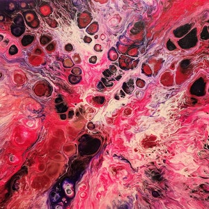 May include: Abstract acrylic pour painting with a vibrant mix of colors. The artwork features a dynamic composition of pink, red, purple, and black hues, creating a visually engaging and textured surface. The fluid art style is evident in the organic shapes and patterns.