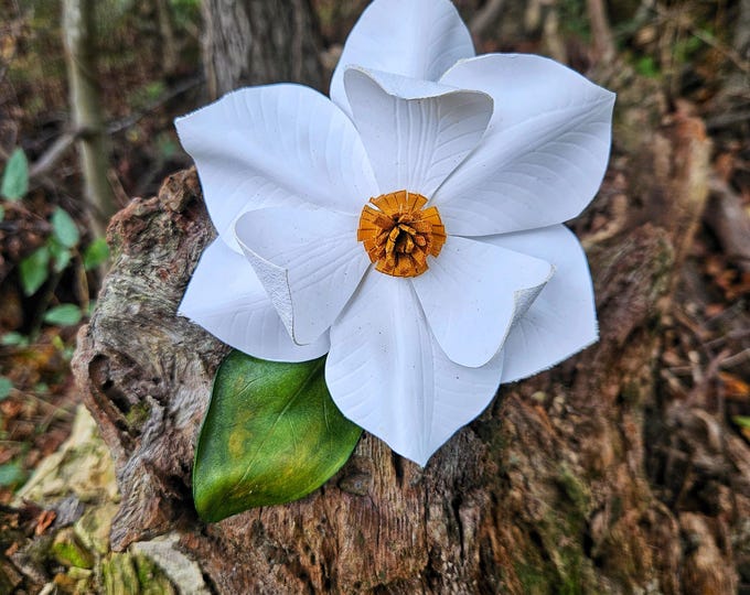Sculpted leather magnolia flower tote tag