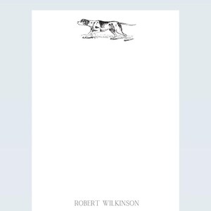 May include: A black and white illustration of a dog running, with the text "ROBERT WILKINSON" at the bottom of the page.