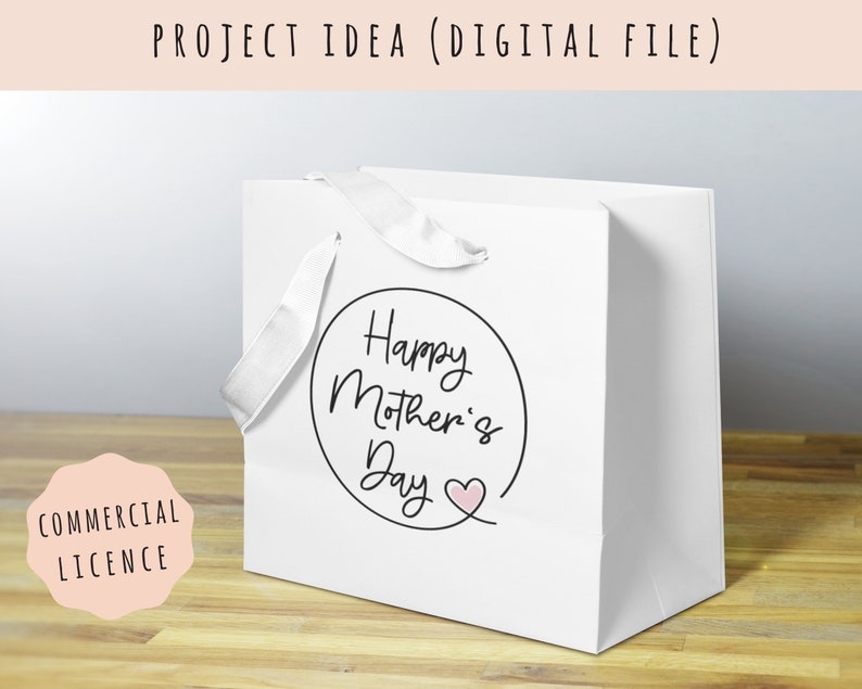 May include: White gift bag with a black circle and the text "Happy Mother's Day" with a pink heart.