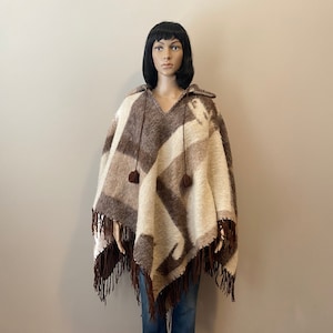 Oversized Wool Poncho Coat from NikkaPlace | Effortless