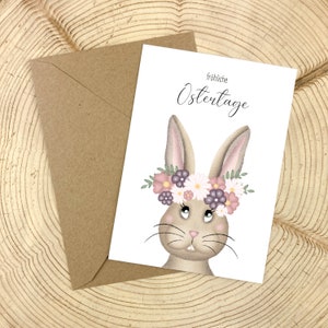 fröhliche Osterzeit Postkarte A6, Blumenkranz, Osterhase, Ostern, Kleinträumer