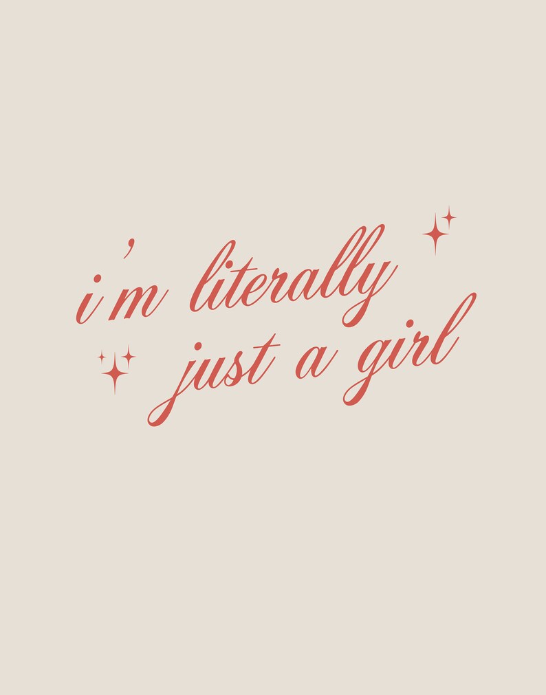 May include: Pink text on a light beige background reads "i'm literally just a girl" with two small stars on either side of the text.