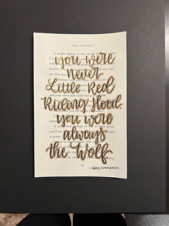 A poster with Abby Wambach’s quote about failure and growth, framed like a motivational piece