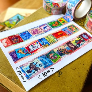 May include: Four rolls of colorful washi tape with a vintage postage stamp design. The tape is 20 mm wide and 10 meters long. The tape features images of animals, flowers, and buildings.