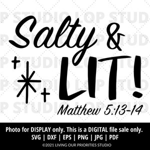 以下が含まれることがあります： 「Salty & LIT! 」と「Matthew 5:13-14」のテキストを含む白黒のグラフィックデザイン。