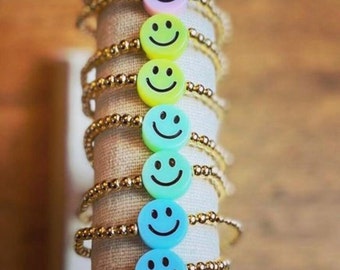 Pastel smiley face 4mm fold plated bracelet