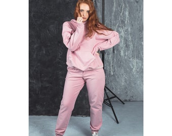 Loose pink tracksuit for women. Solid oversized hoodie and jogging pants. Classic cotton sweatpants and sweatshirt set. Comfy loungewear set