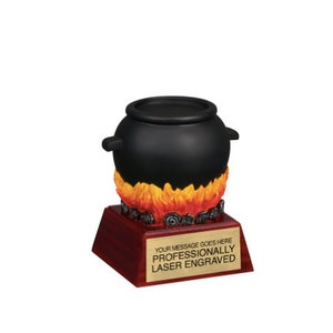 May include: Black cauldron trophy with flames and a red wooden base. The base has a gold plaque with the text "Your message goes here professionally laser engraved".