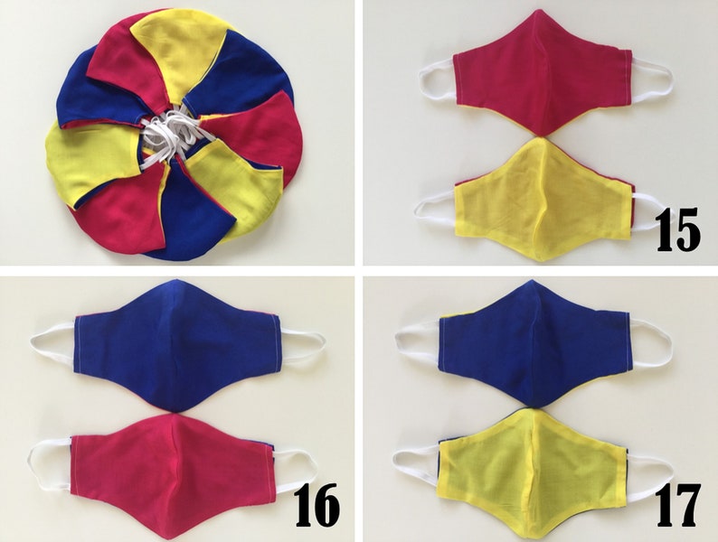 May include: Four fabric face masks in yellow, blue, and pink. The masks are arranged in pairs, with the top pair labeled "15" and the bottom pair labeled "16" and "17".