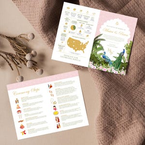 May include: Wedding invitation suite with a pink and gold color scheme. The invitation features peacock illustrations and the names of the couple. The suite includes a trifold with wedding details and a ceremony steps card.