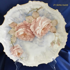 Hand painted porcelain handing round plate