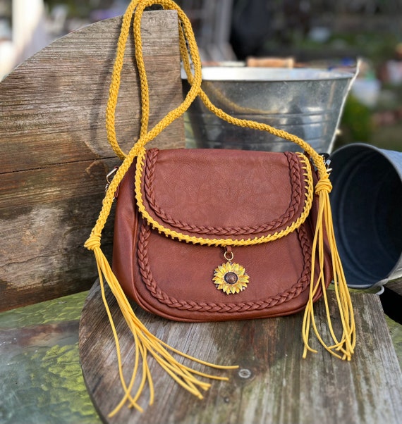 Brown Crossbody Purse With Yellow Braided Strap and Sunflower