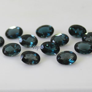 5x7mm Oval Faceted London Blue Topaz Gemstone