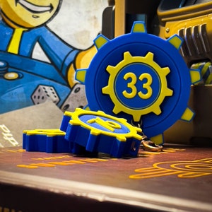 ¡Elige tu bóveda! Llavero y soporte magnético de Fallout Vault: ¡objetos de recuerdo postapocalípticos!