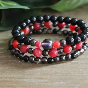Kralenarmbanden voor dames | zwarte glaskralen en felroze glaskralen | rekbare armband | elastische armband