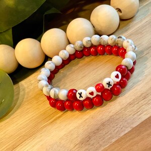 Beaded handmade bracelet for women | stretchy bracelet | elastic bracelet | red and neutral beads accented by heart beads