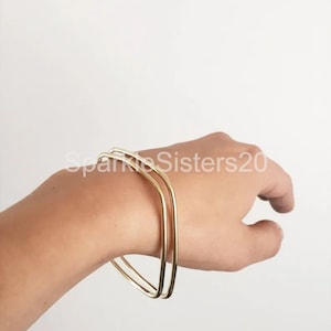 Armbandsset i massiv mässing med fyrkantigt hänge: Rundad form