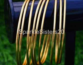 Juego de 7 pulseras apilables de latón bañado en oro hechas a mano