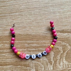 Kpop Demon Hunters &#39;Mira&#39; keyring. A beaded inspired keyring of the movie Kpop Demon Hunters