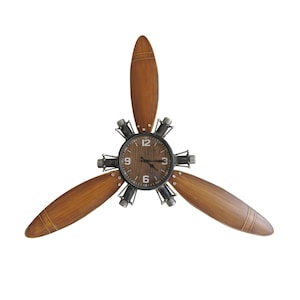 May include: A brown wooden propeller clock with a black face and white numbers. The clock is designed to look like an airplane propeller.