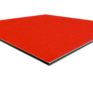 May include: A square, red panel with a glossy finish. The panel has a black core and a silver edge. The product is likely a building material or decorative element.