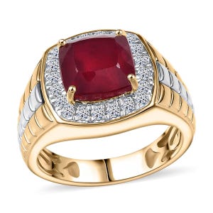 May include: A gold ring featuring a large, square-cut, deep red ruby center stone, surrounded by a halo of small, sparkling white diamonds. The ring has a gold band with silver accents.