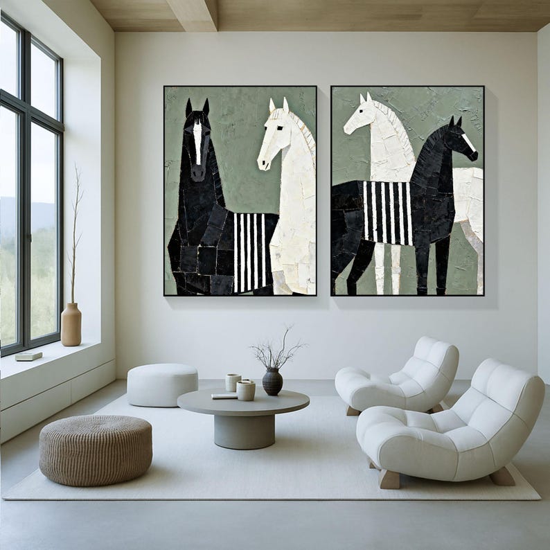 May include: Two framed abstract paintings of horses. One painting features a black horse and a white horse, both with striped patterns. The other painting has a black and white horse. The background is a muted green.