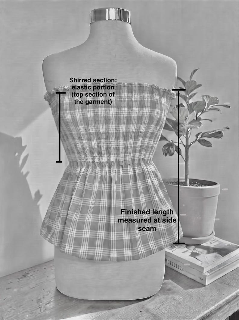 May include: A strapless plaid top on a mannequin featuring a shirred elastic upper section and a flared hem. Text on the image indicates the shirred section and the finished length measured at the side seam. The garment has a checkered pattern.