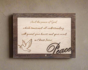 May include: A wooden plaque with a dove and the text "And the peace of God which transcends all understanding, will guard your hearts and your minds in Christ Jesus. Peace Philippians 4.7"
