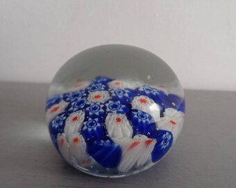 Vintage red white and blue   millefiori glass paperweight. Murano glass paperweight