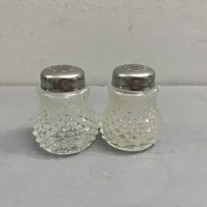 Small French glass salt and pepper shakers. Miniature vintage condiment set. Small diamond cut glass salt and pepper pots.