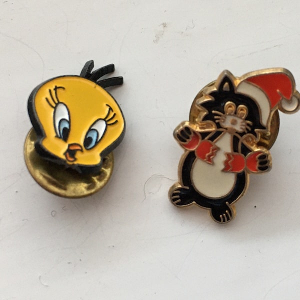 Vintage collectible pin badges - tweety pie and Sylvester. Cartoon pin badge brooch