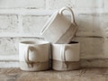 Handmade White Stoneware Mug: Rustic Minimalist Pottery Tea Cup product logo