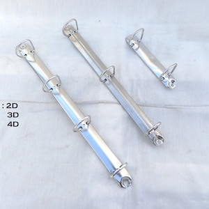 May include: Three silver binder rings, with 2, 3, and 4 rings, respectively.  RING: 2D 3D 4D