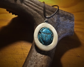 Egyptian scarab carved in arizona turquoise.