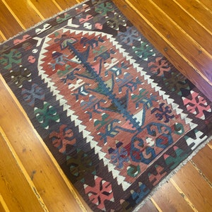 Vintage Turkish Kilim Rug: Anatolian Esme Wool Rug (140x102 cm)