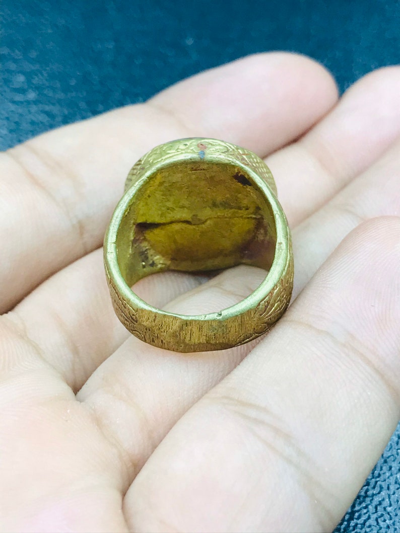 Handmade brass ring from Afghani with orange glass