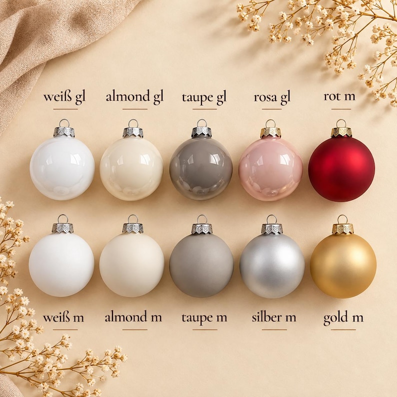 May include: Ten spherical Christmas baubles arranged in two rows of five. The top row features glossy finishes in white, almond, taupe, pink, and red. The bottom row features matte finishes in white, almond, taupe, silver, and gold, each with a metal cap.