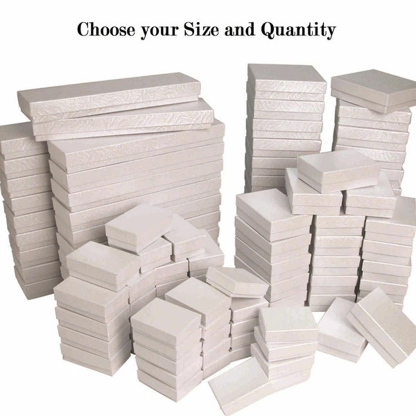 Various size and quantities of our classic white swirl cotton filled boxes
