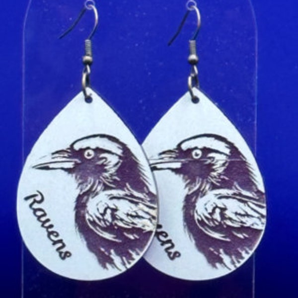 Baltimore Ravens football teardrop purple and white acrylic laser cut earrings. Dangle or stud. Great for a tail gate party, game or gift