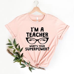 Leraar shirts voor vrouwen, ik ben een leraar shirt, superkracht leraar shirt, ik ben een leraar What&#39;s Your Superpower T-shirt, leraar bril shirt