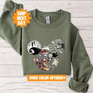 a green shirt with a picture of jack and jack on it